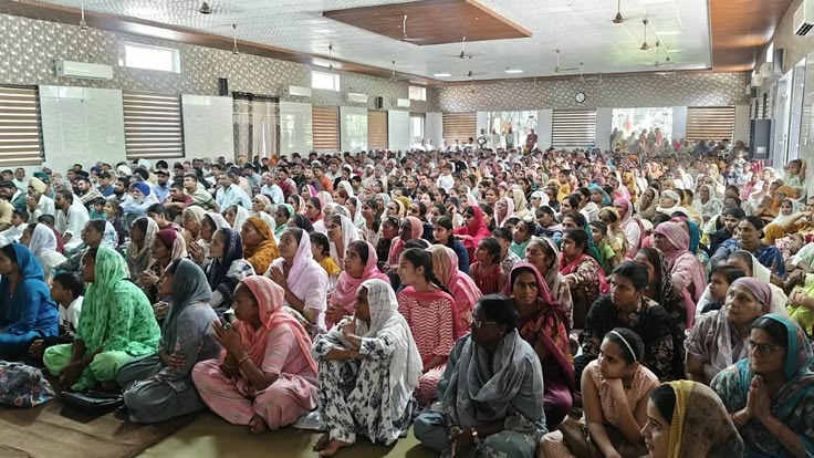 Congregation and community members joining hands in worship and earnest prayer